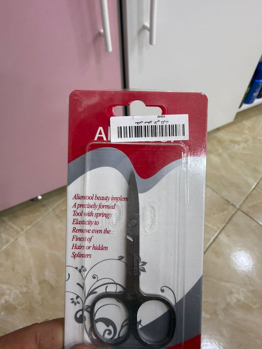 Small scissors on a card