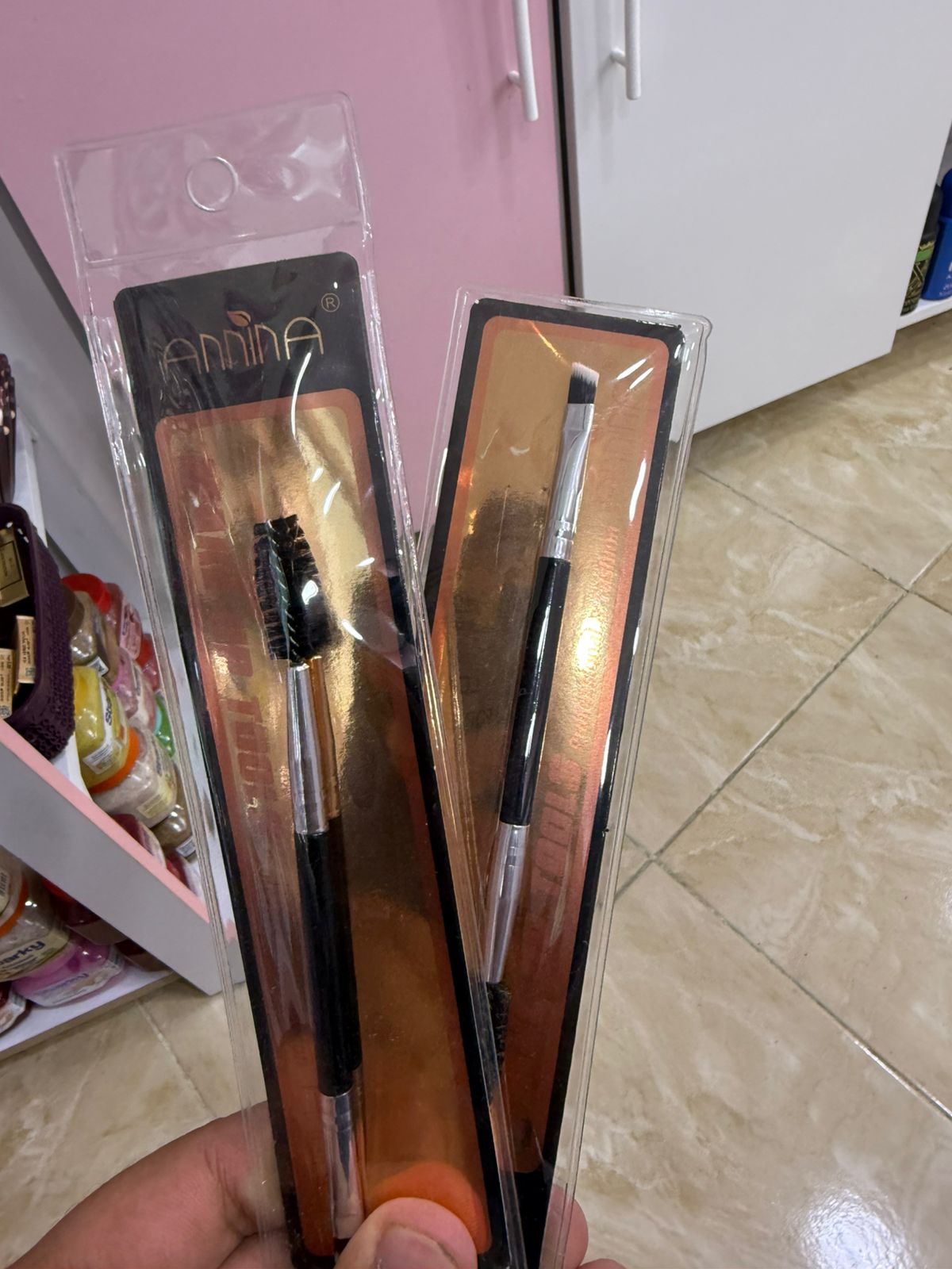 Mascara brush and double black eyebrow brush